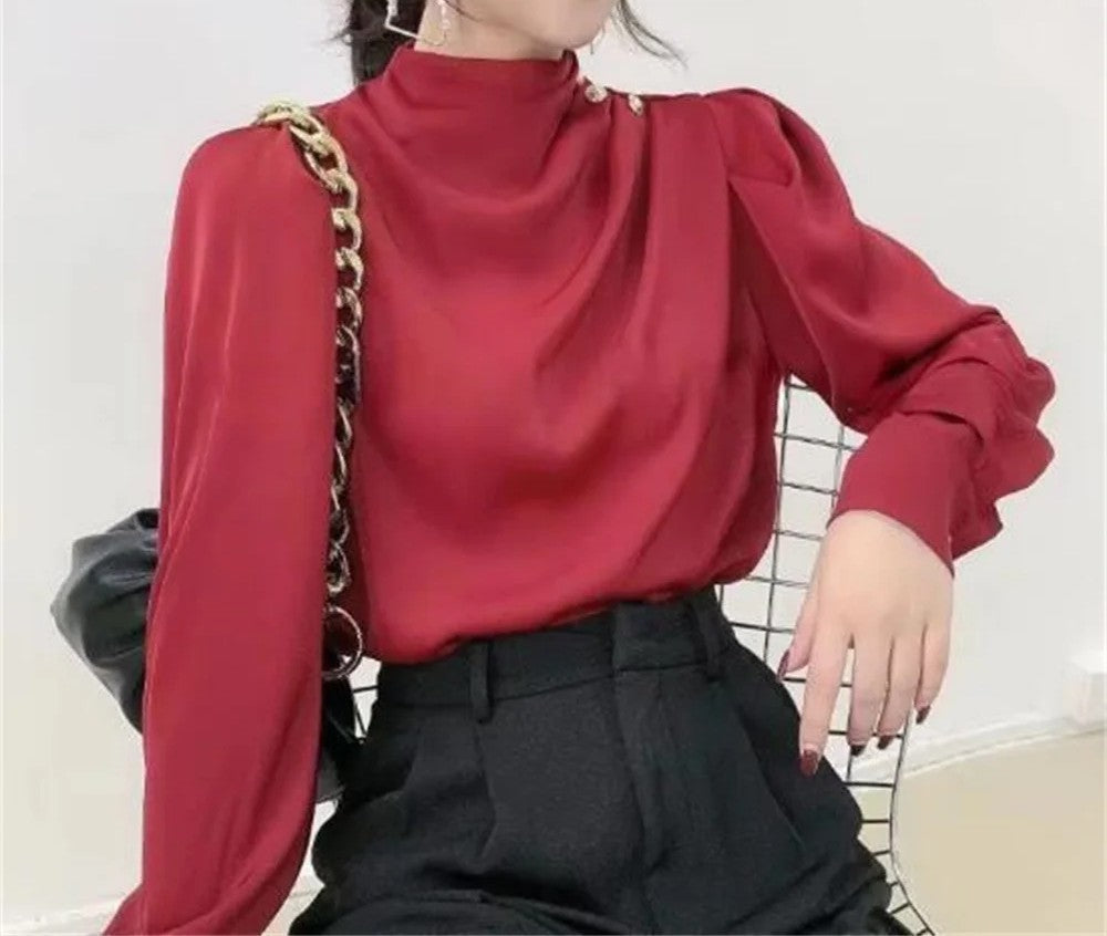 Damesblouse met lange mouwen en gedrapeerd detail