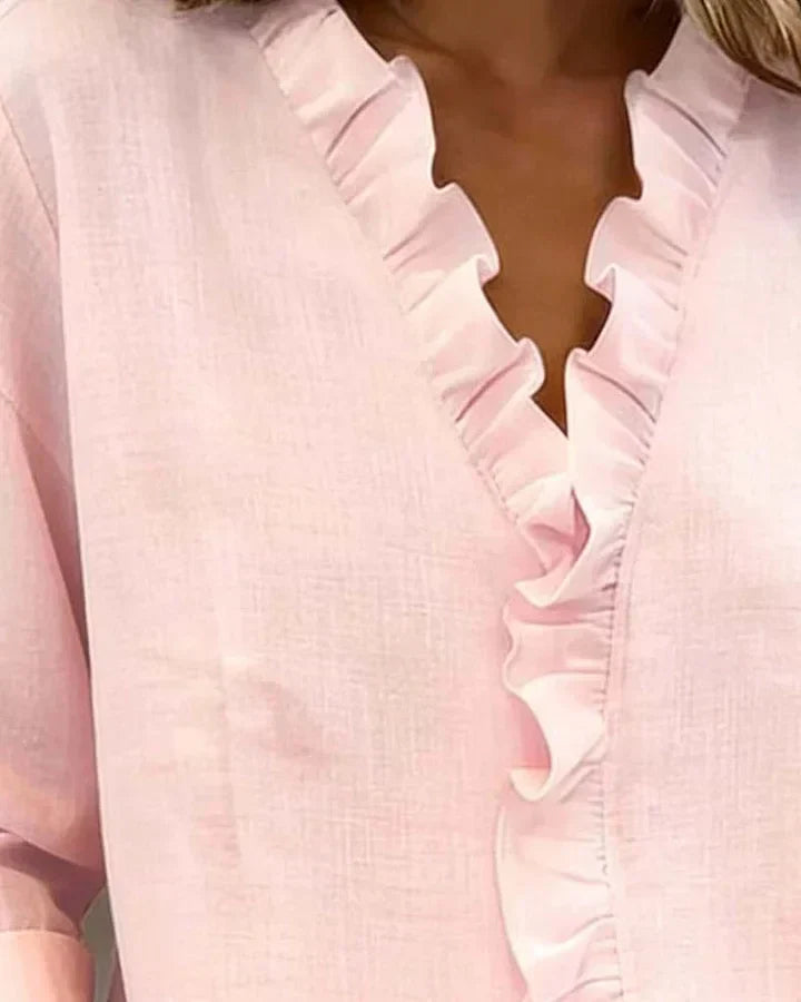 Damesblouse met lange mouwen, V-hals en roesjes