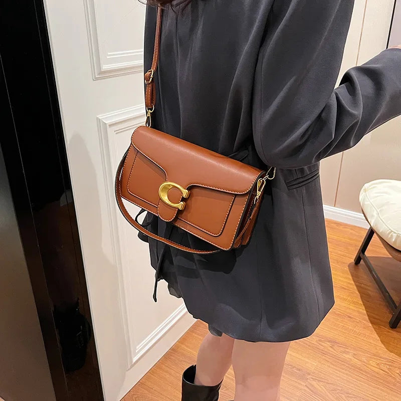 Minimalistische vierkante schouder- en crossbodytas