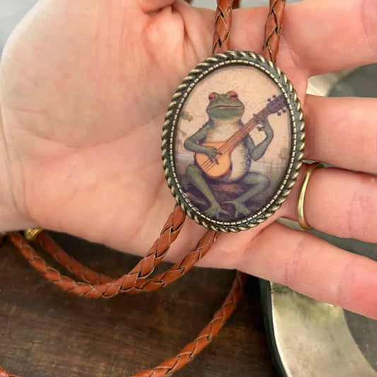 Bolo tie met banjospelende kikker