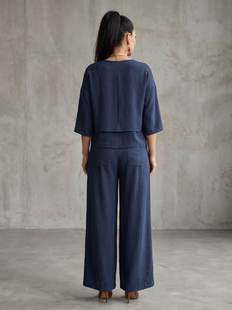 Dames set in laagjeslook met wijde pijpen