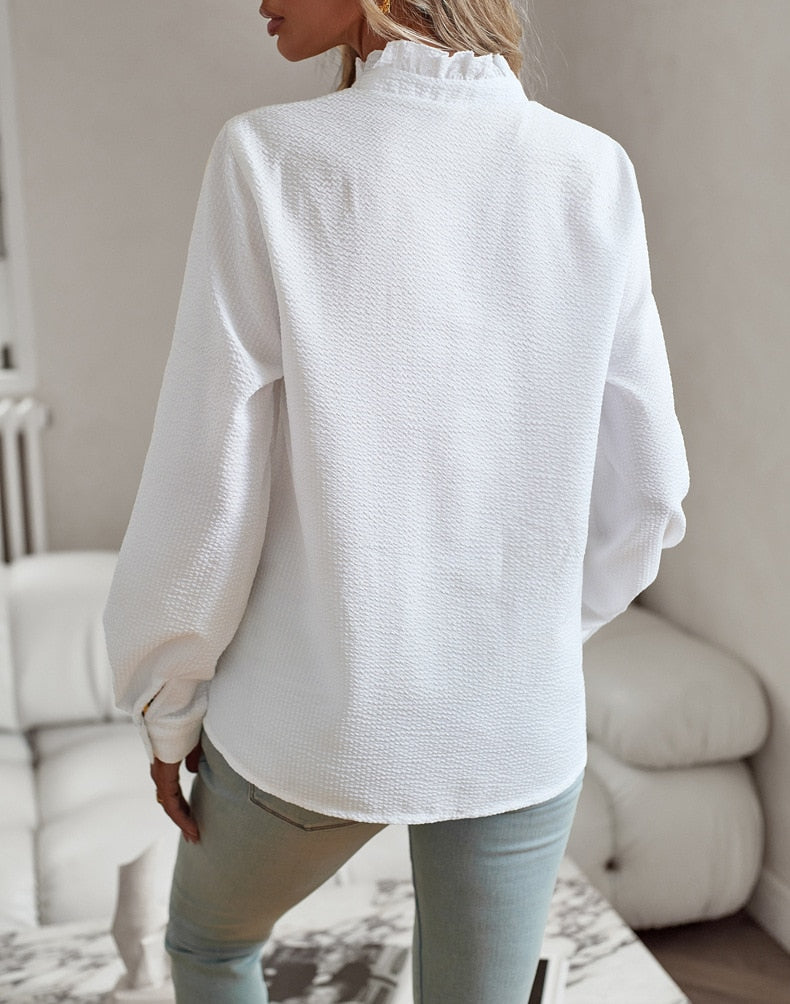 Damesblouse met lange mouwen en ruches