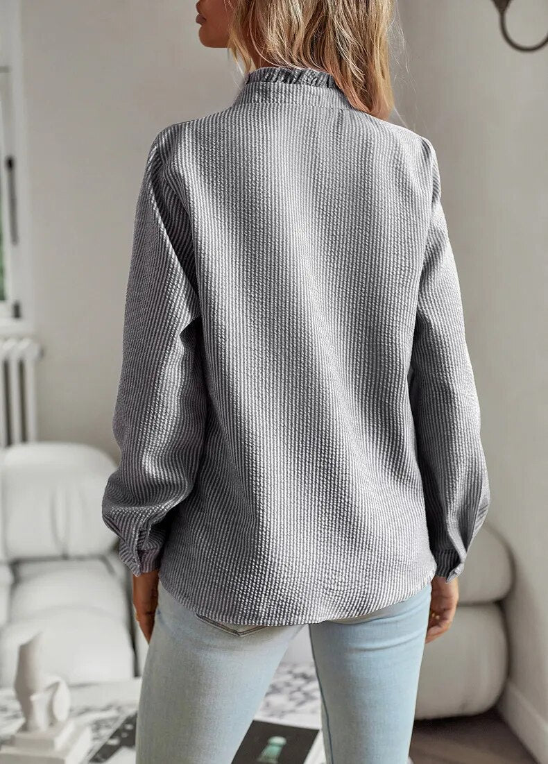 Damesblouse met lange mouwen en ruches