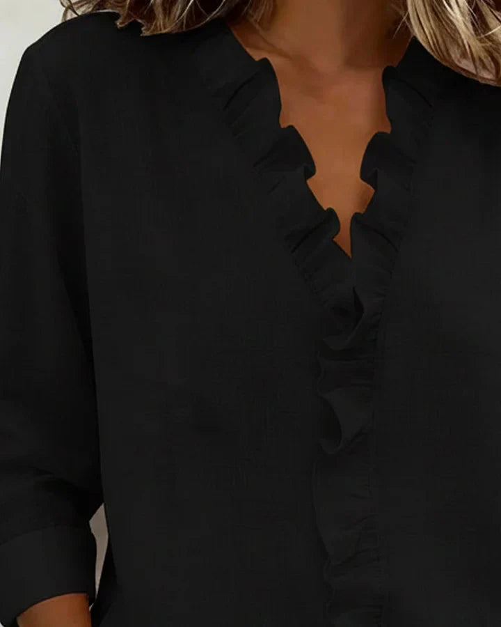 Damesblouse met lange mouwen, V-hals en roesjes