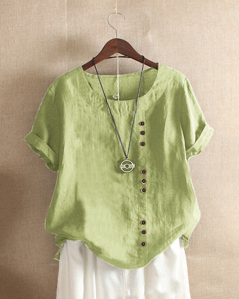 Damestop met korte mouwen en elegante knoopdetails
