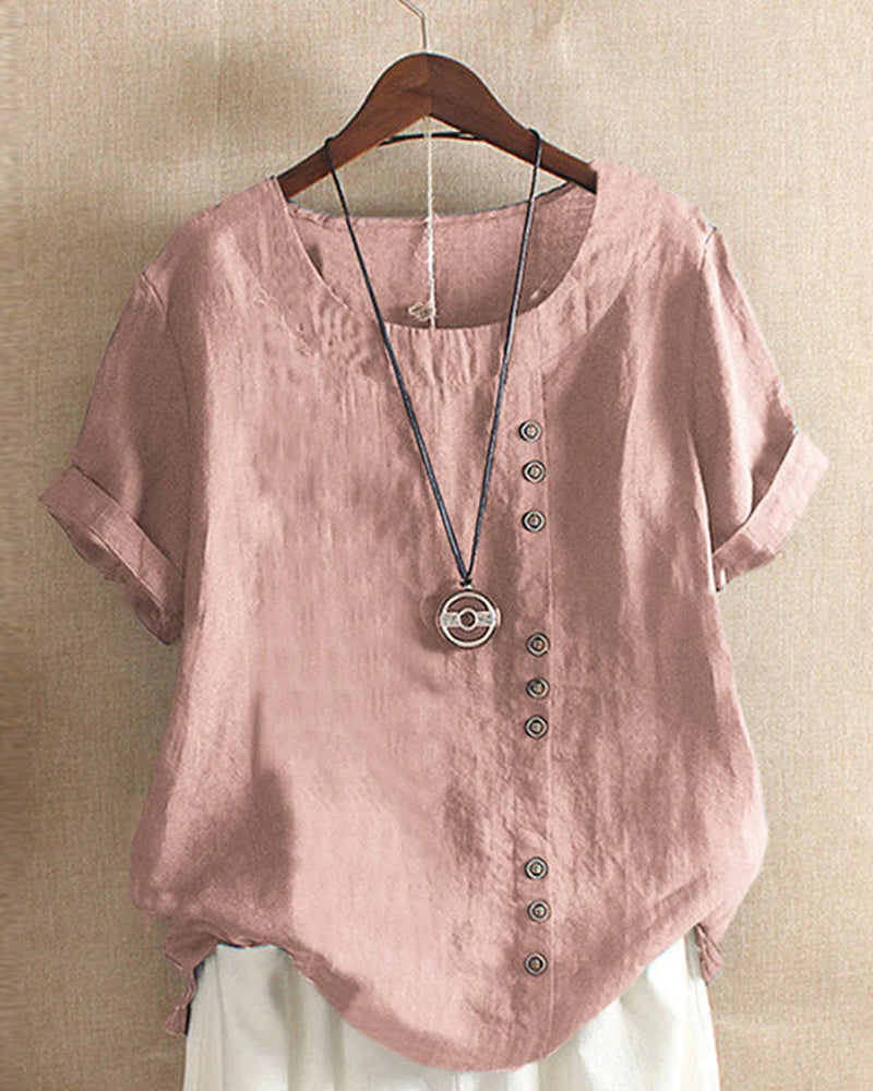 Damestop met korte mouwen en elegante knoopdetails