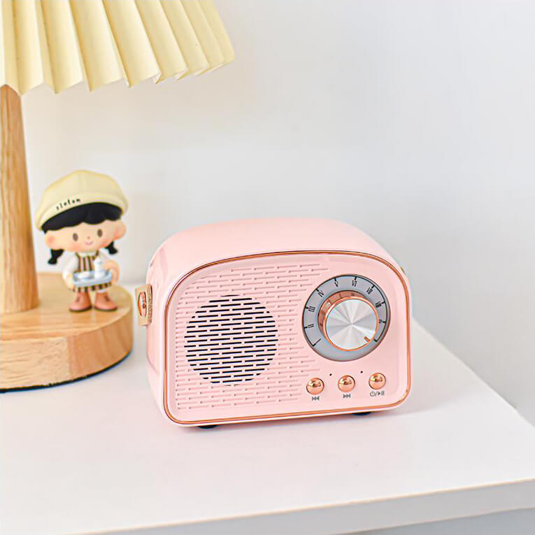 Draagbare bluetooth-speaker in retrostijl met hoogwaardige geluidskwaliteit en lange batterijduur – compact en stijlvol ontwerp