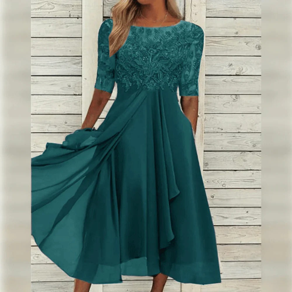 Elegante midi-jurk met kantdetail en soepelvallende rok voor feestelijke gelegenheden