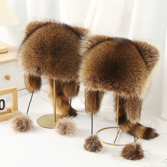 Warme wintermuts van imitatiebont met pompons