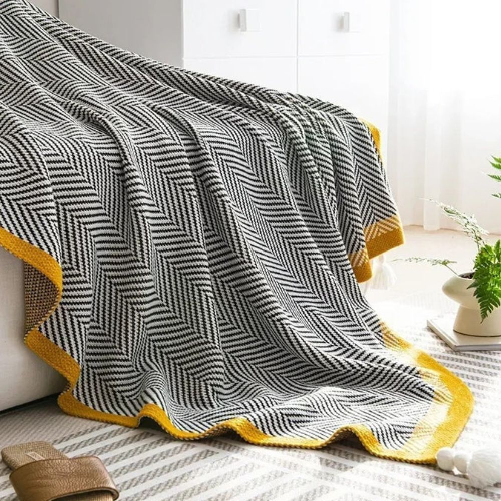 Luxe deken met gouden zigzagpatroon