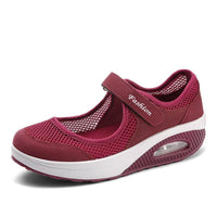 Modieuze ademende damessneakers