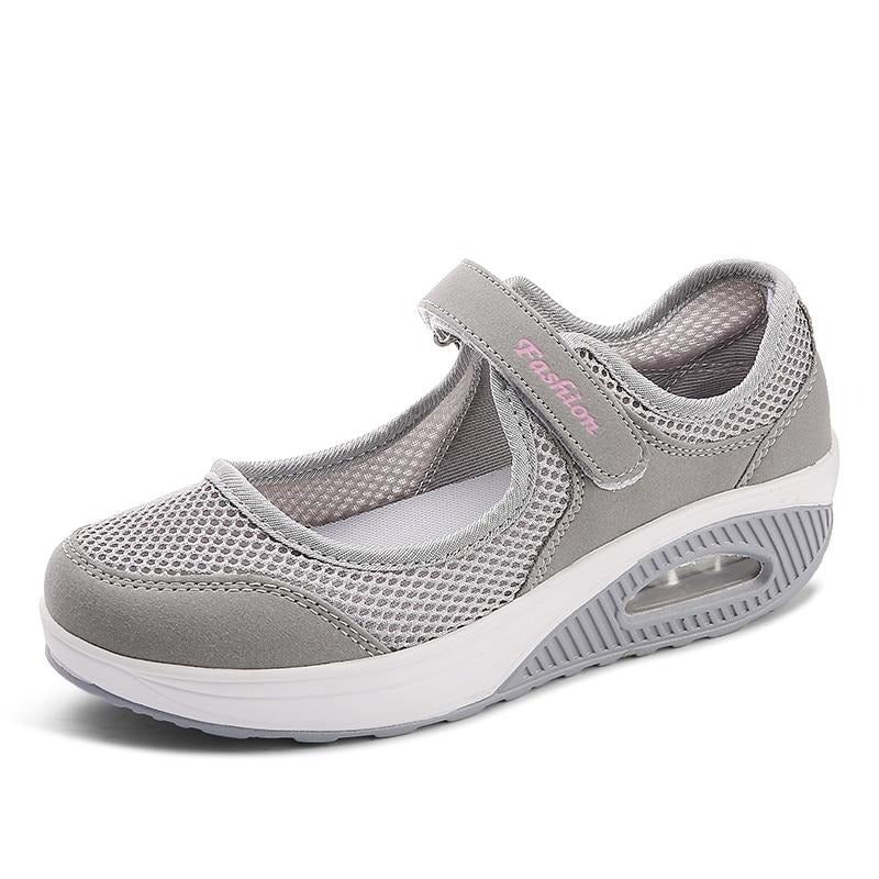 Modieuze ademende damessneakers