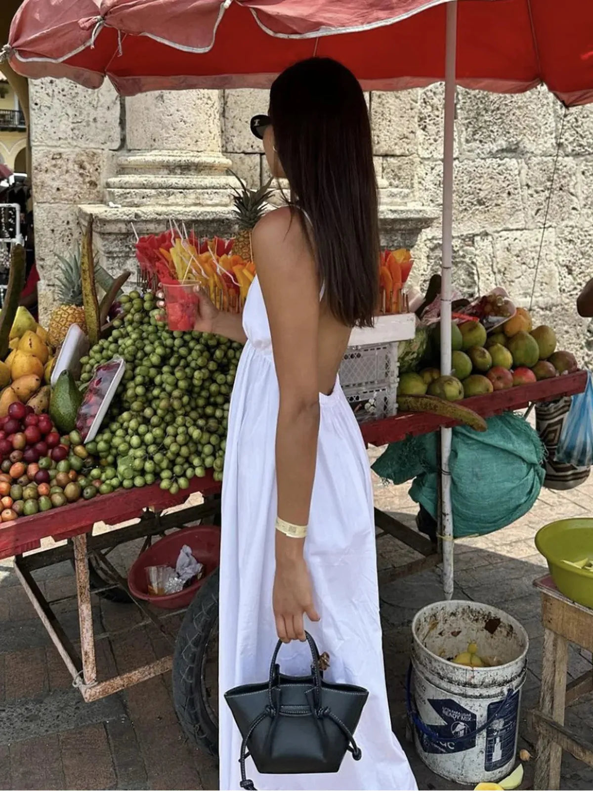 Mouwloze maxi-jurk met open rug en V-hals