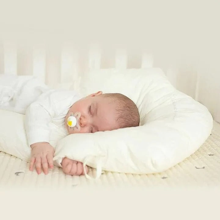 Ondersteuningskussen voor baby's met verstelbare zijkanten en hoofdzone