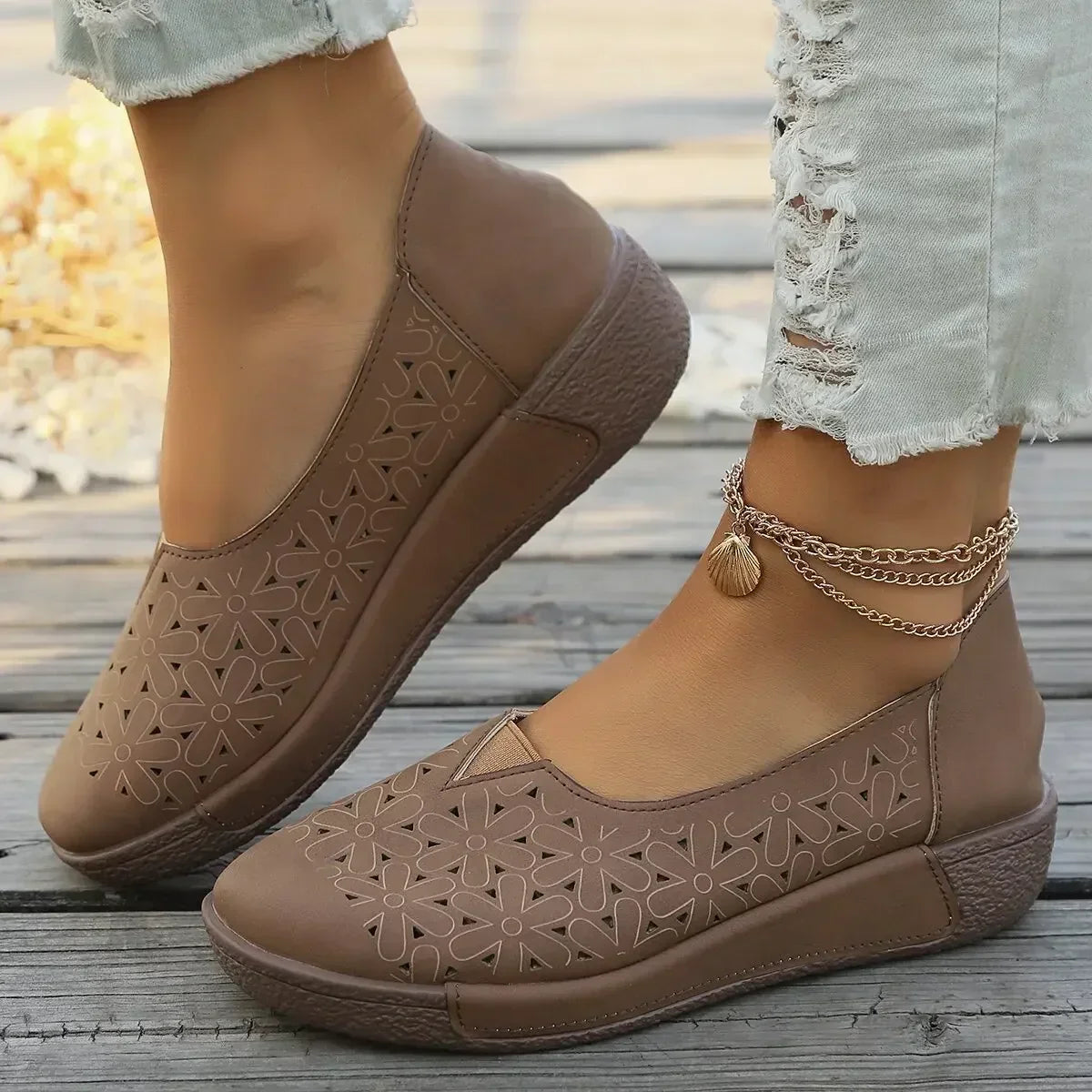 Orthopedische mocassins voor dames met leren bovenwerk en sleehakzool