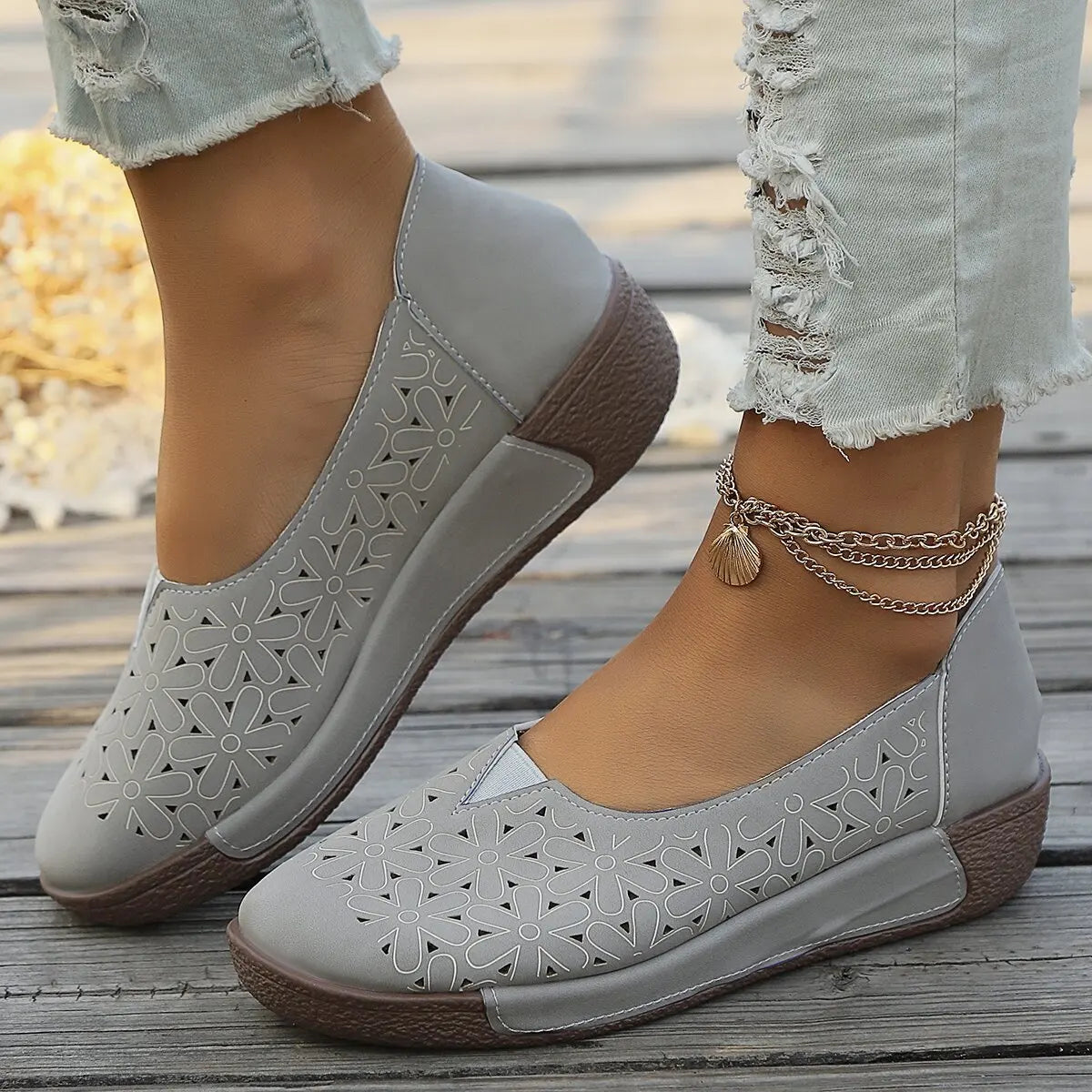 Orthopedische mocassins voor dames met leren bovenwerk en sleehakzool