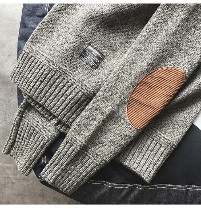 Oversized gebreide herentrui met elleboogstukken