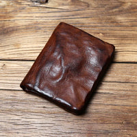 Portemonnee van volnerfleer met patina