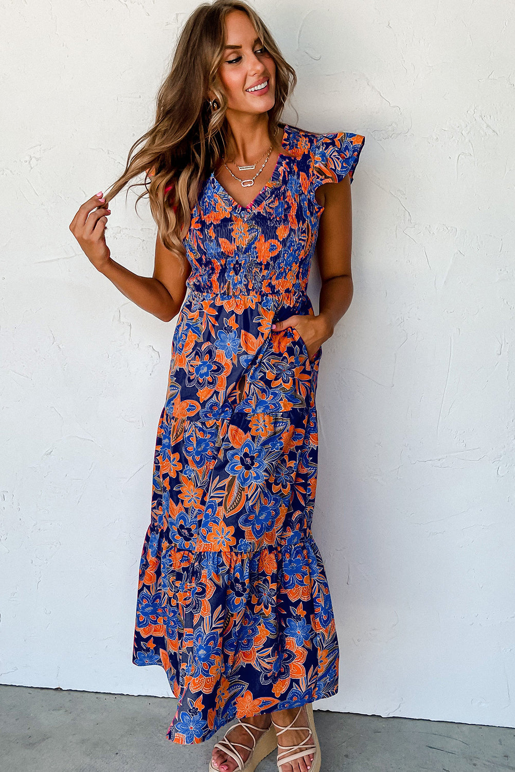 Zomerse maxi-jurk voor dames met smockwerk en bloemenprint