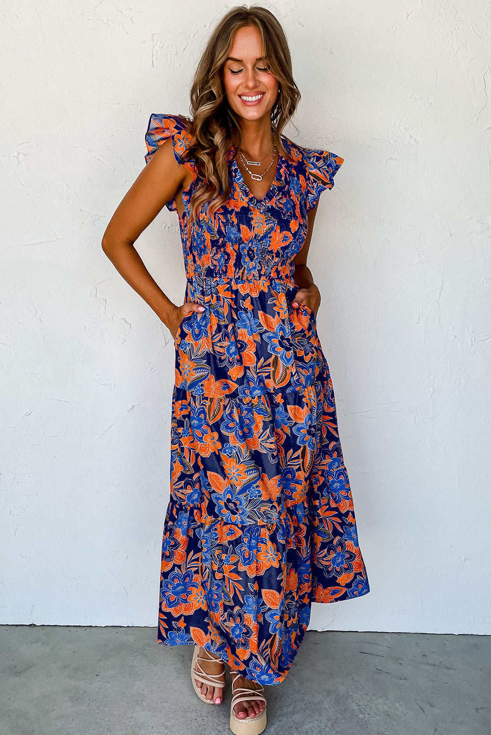 Zomerse maxi-jurk voor dames met smockwerk en bloemenprint